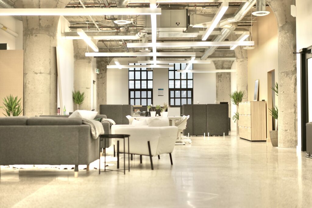 A Open Office with cubicles in the back.