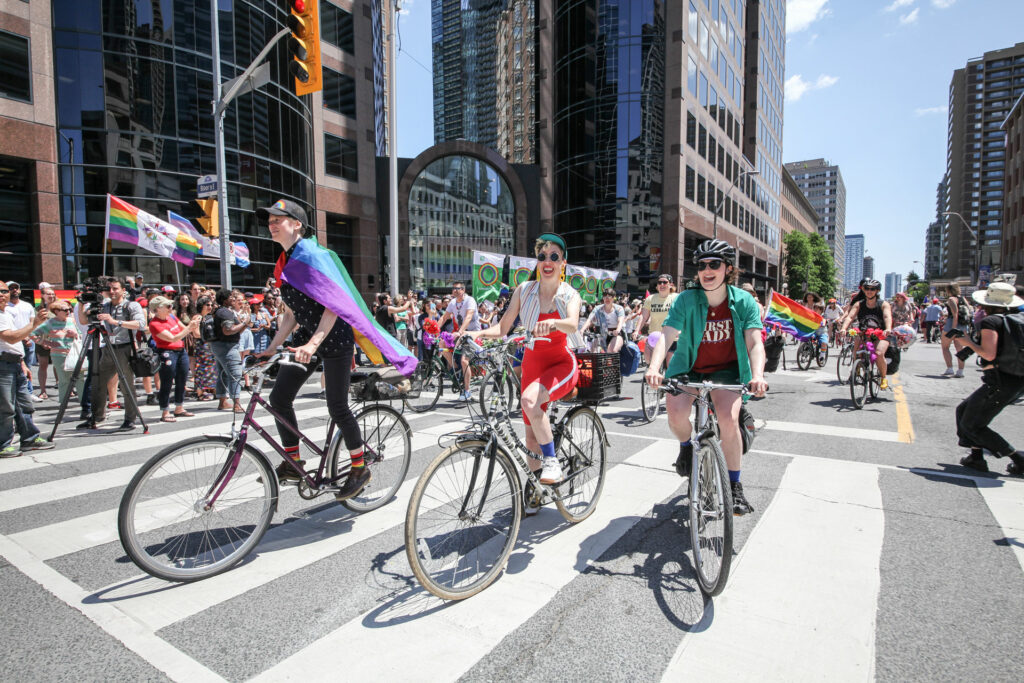 A group of three people on bikes