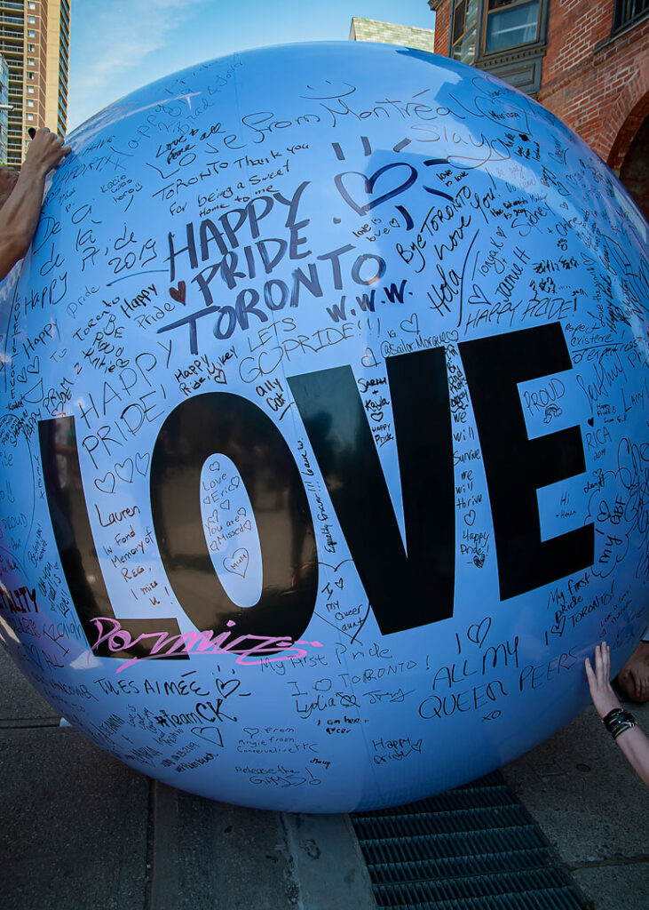 A big plastic ball with the word 'love' on it.